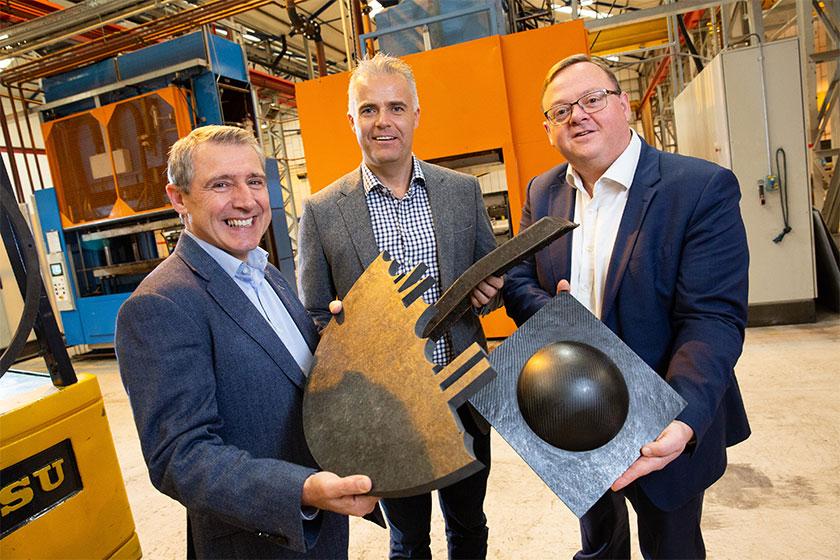 3 men from CFP Composites holding their ultra-lightweight and cost-efficient heat resistant materials