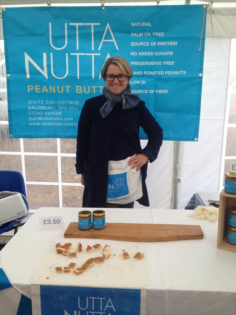 Katie Sargent, the owner of Utta Butter peanut butter stood behind a stand selling he product