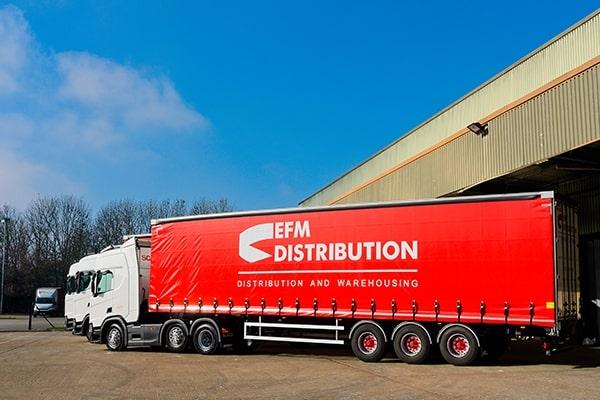 An EFM Distribution articulated lorry parked in the business's lorry yard