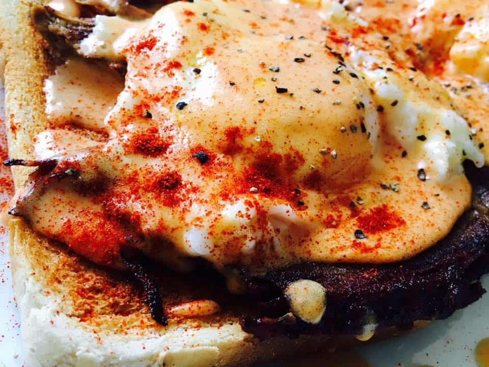 Close up of seasoned eggs on toast from Old School BBQ Bus